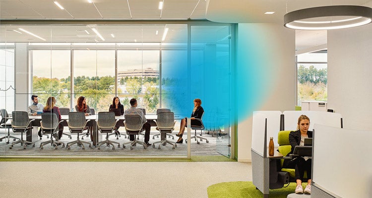  A group of working professionals in a conference room with a blue gradient around the woman at the head of the table and an overlaying closer up image of a woman working independently at her desk