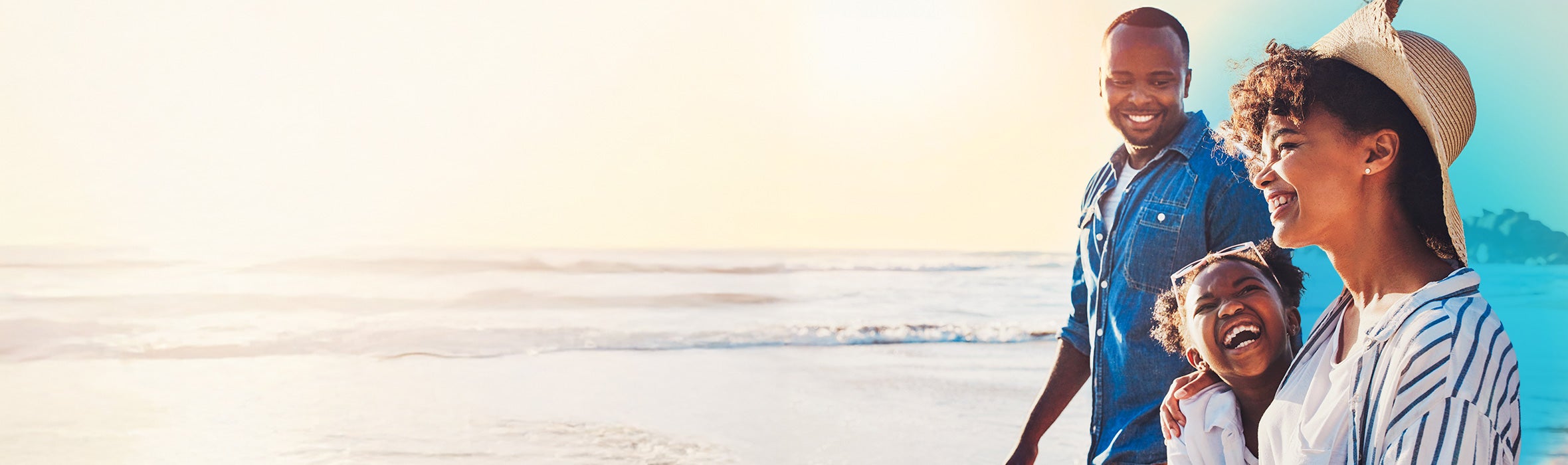 Two African American parents smiling and walking with their young daughter who is smiling as they're walking on the beach with blue gradient hovering around them 