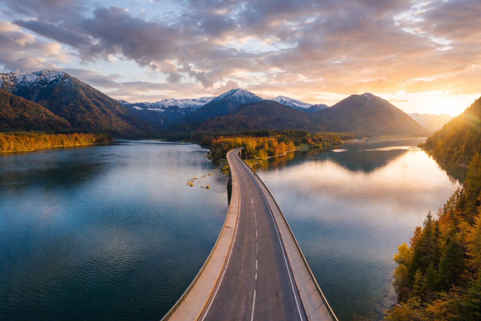 Bavaria Germay Road over lake towards mountain range